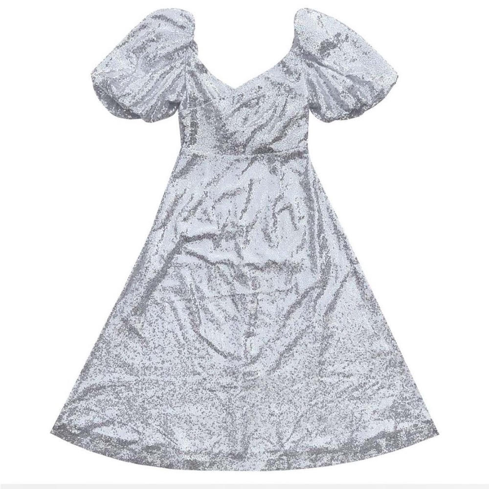 Flawed gem: Ali Golden cross front dress with silver sequins